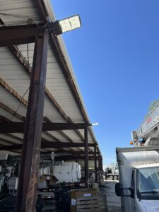 New outdoor LED floodlights installed on a commercial building by TCL Electrical and Lighting in North Aurora, IL