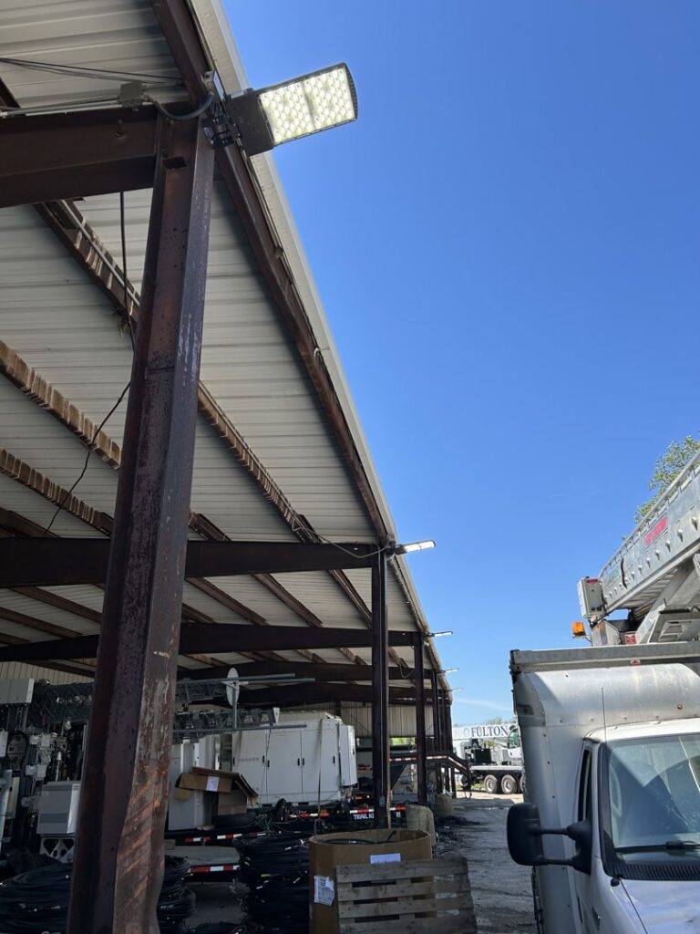 New outdoor LED floodlights installed on a commercial building by TCL Electrical and Lighting in North Aurora, IL