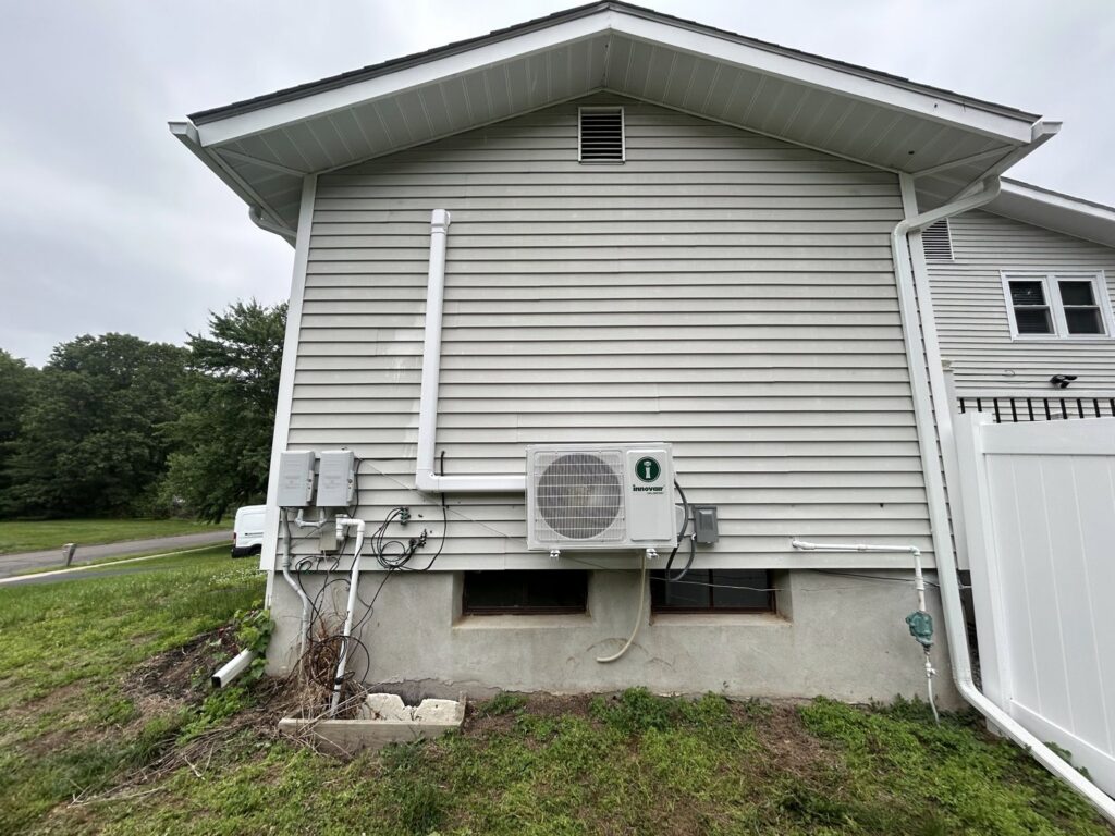 An outdoor mini-split air conditioning unit installed on the exterior of a home by Express Home Services LLC in Las Vegas, NV.