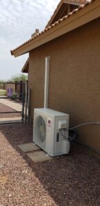 An outdoor mini-split air conditioning condenser unit installed by Brisk Air Inc in Phoenix, AZ.