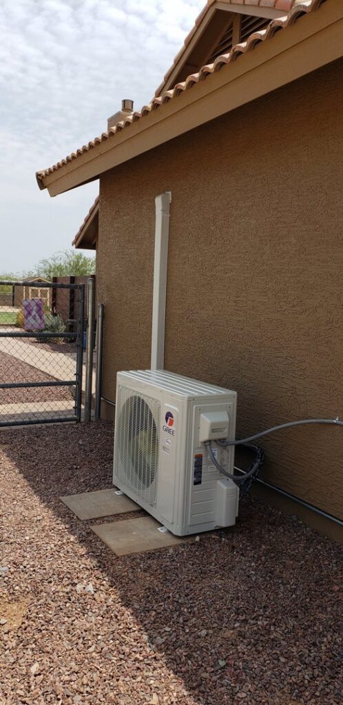 An outdoor mini-split air conditioning condenser unit installed by Brisk Air Inc in Phoenix, AZ.