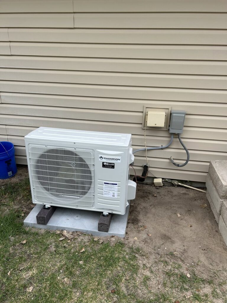 An outdoor mini-split condenser unit professionally installed by Millard Heating & Cooling in Elkhorn, NE.