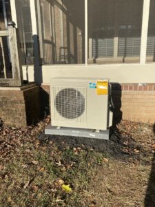 An outdoor mini-split condenser unit installed by Subzero Mechanical LLC Heating & Air in Concord, NC.