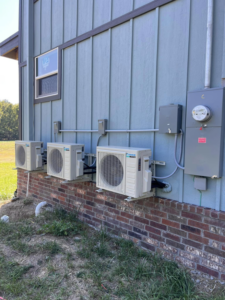 Multiple outdoor Daikin mini-split condenser units installed on a building by Smartcool Inc. in Pine Bluff, AR.