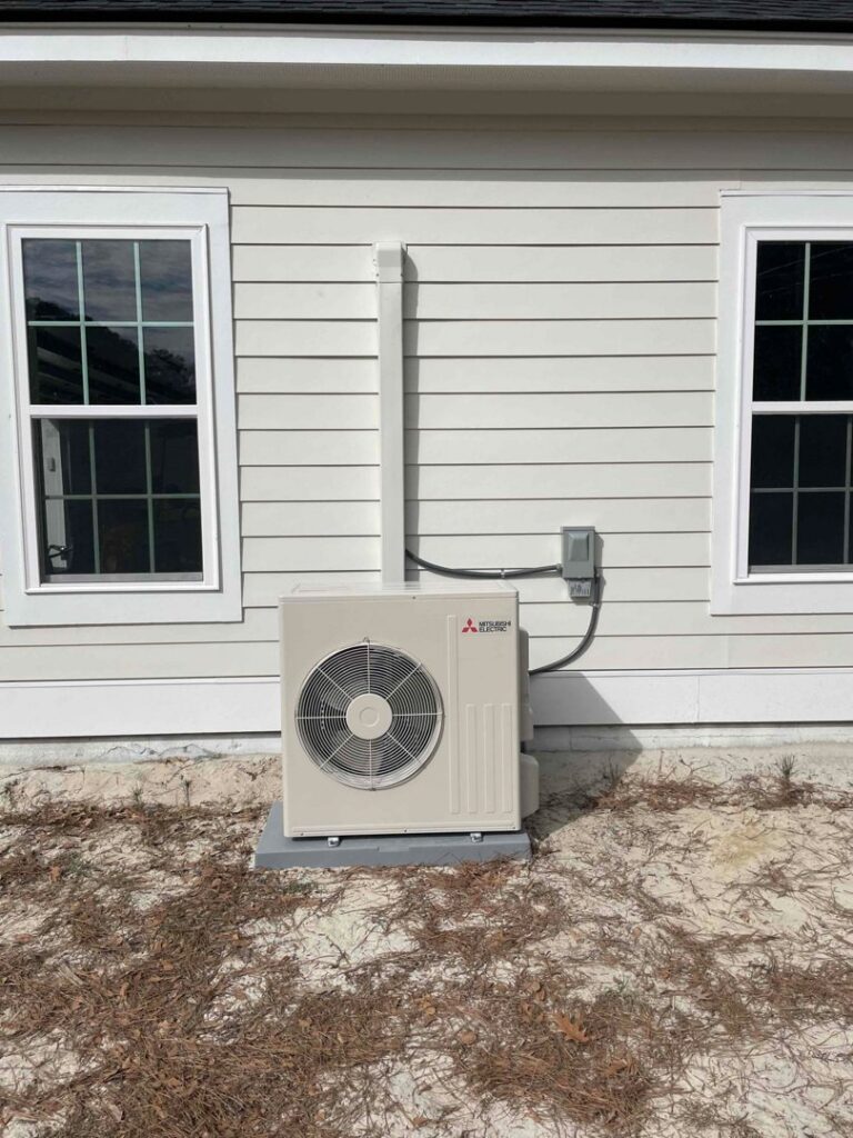 An outdoor mini-split HVAC unit professionally installed next to a home by 5 Star Charleston Heating and Air in Charleston, SC.