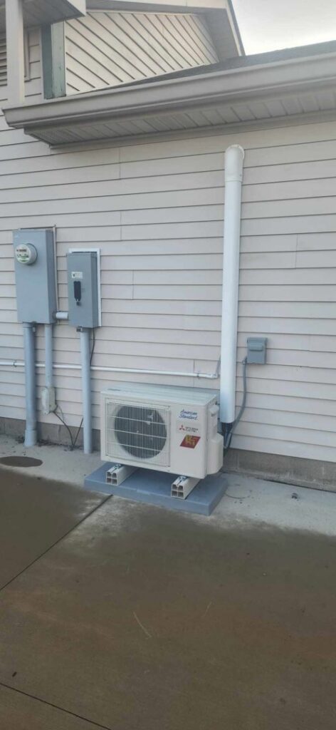 An outdoor mini-split HVAC unit professionally installed by Blue Fox Heating & Cooling in Lebanon, IN.