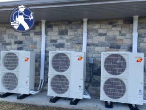 Outdoor mini-split HVAC units installed on a building by Fayette Plumbing & HVAC in Lexington, KY.
