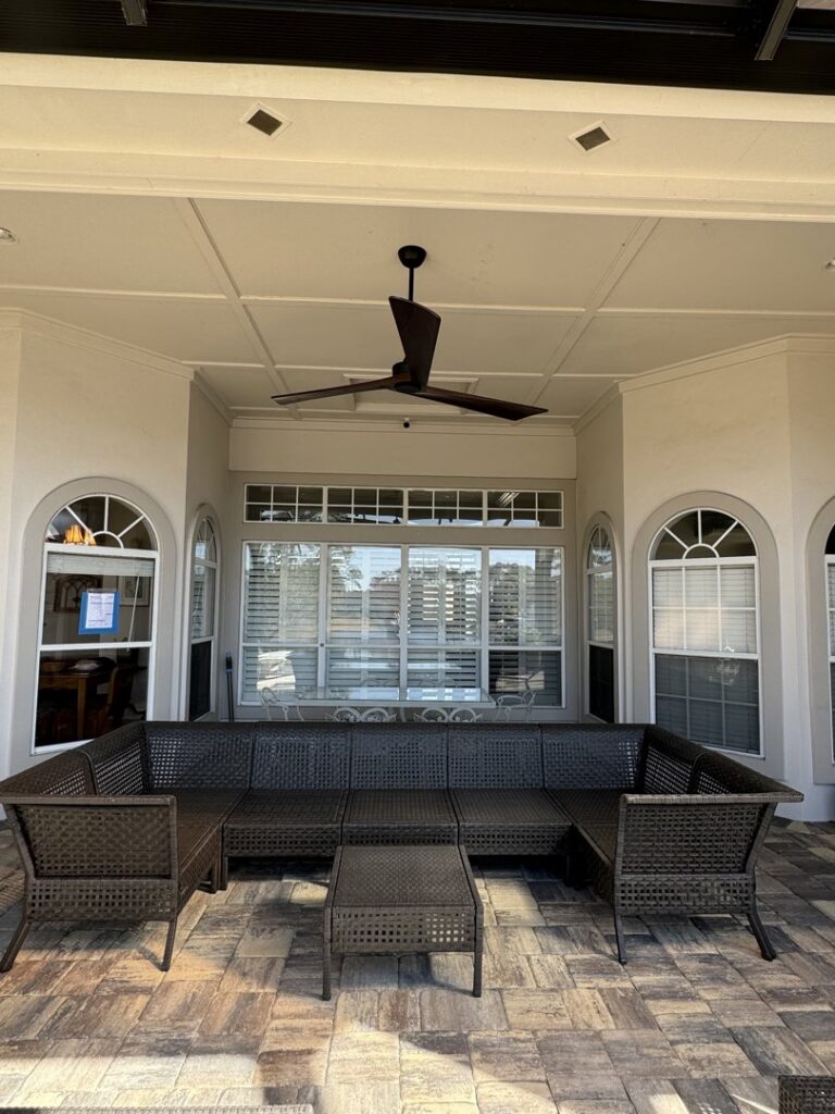 A large ceiling fan installed on an outdoor patio by Crawford Electric Services, LLC in Kings Mountain, NC.