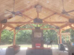 An outdoor patio with multiple ceiling fans and recessed lights installed by Warner Electric Service, LLC in Broken Arrow, OK.