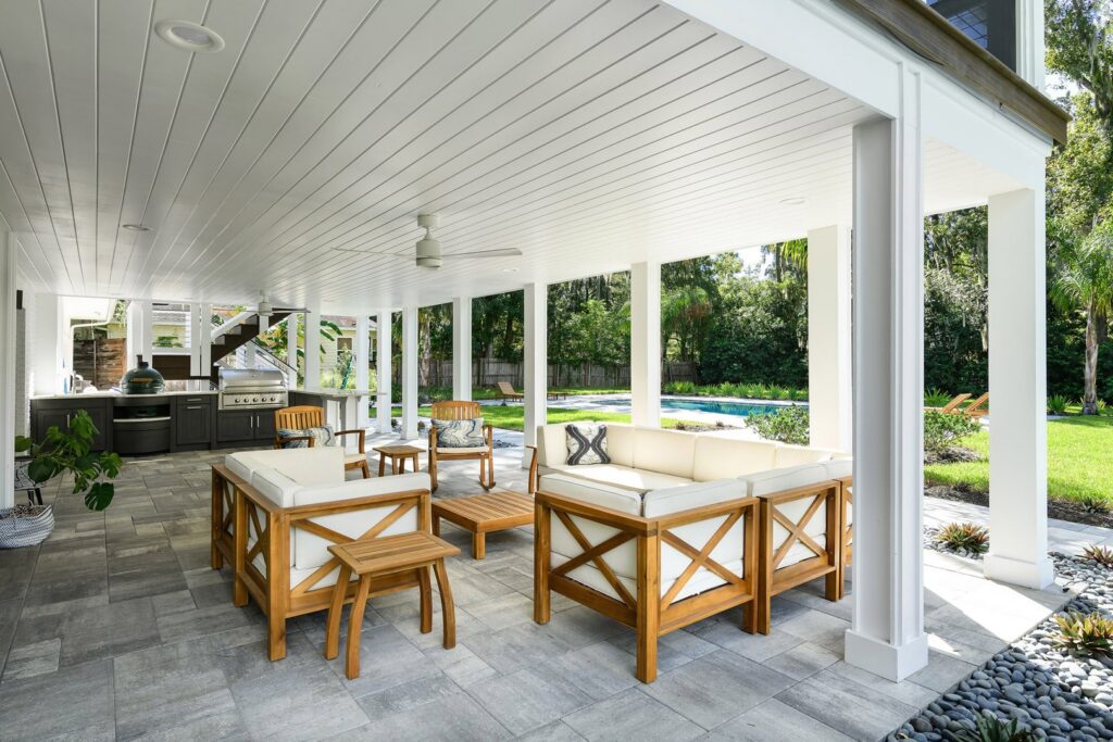 Outdoor patio with ceiling fan, recessed lighting, and outdoor kitchen electrical hookups by Performance Electrical Contracting Inc. in Jacksonville, FL