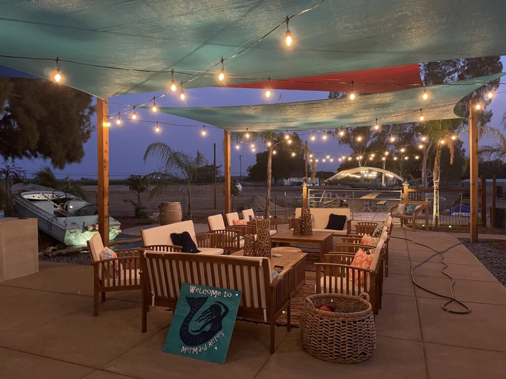 An inviting outdoor patio with string lighting installed by The Lighting Geek in Sacramento, CA.