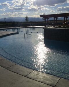 An inviting outdoor pool with a scenic mountain view, installed by Wetworks Pool and Spa in Englewood, CO.