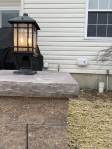 An elegant outdoor post light fixture installed by CLB Electrical LLC, enhancing a property in Townsend, DE.