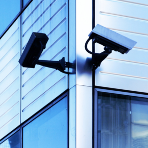 Outdoor security cameras mounted on a building, installed by Access Hardware Inc in Honolulu, HI