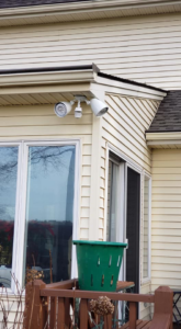 An outdoor security light installed on the exterior of a home by KC Electric in Pompton Plains, NJ.