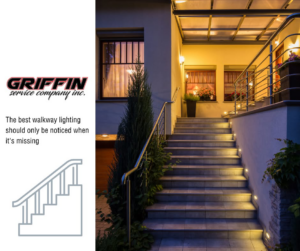 Professionally installed outdoor walkway lighting illuminating stairs at night by Griffin Service Company in Tampa, FL