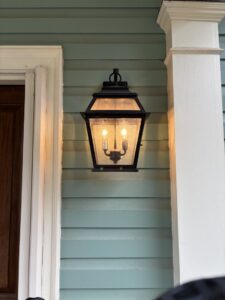 An outdoor wall lantern installed on a home by Onsite Electrical Services in Raleigh, NC.