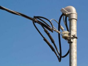 Overhead electrical service lines connection by Madison Electrician Now in Madison, AL.