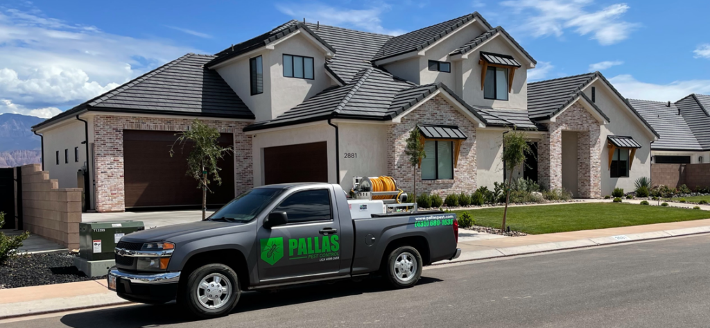 Pallas Pest Control truck with equipment parked in front of a modern home in Saint George, UT.