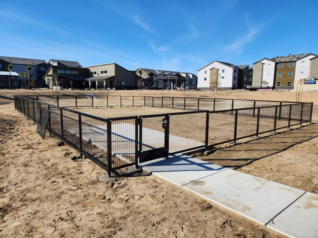 A secure community dog park featuring durable mesh fencing installed by Palmers Iron Fence in Sacramento, CA.