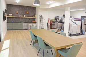 Patriot Mills carpet display featuring diverse options for residential and commercial projects at Luke Brothers Flooring in Ankeny, IA.