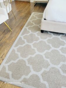 A clean, patterned area rug in a bedroom by JP Carpet Cleaning Expert Floor Care in Granada Hills, CA