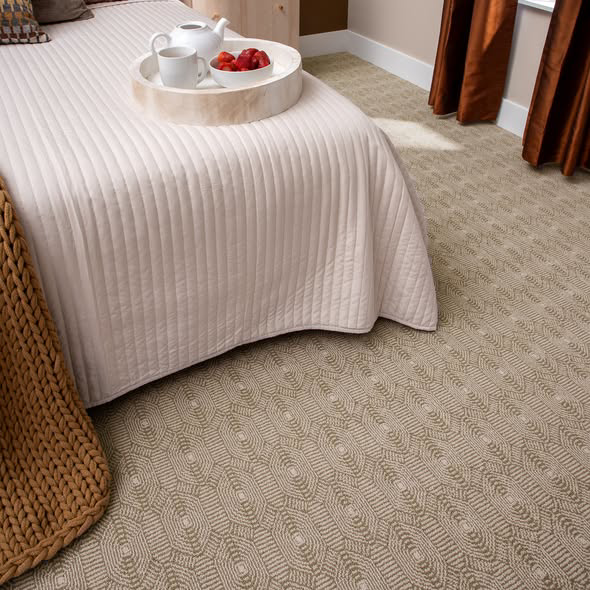 A modern bedroom showcasing stylish patterned carpet from Levi's 4 Floors in Columbus, OH