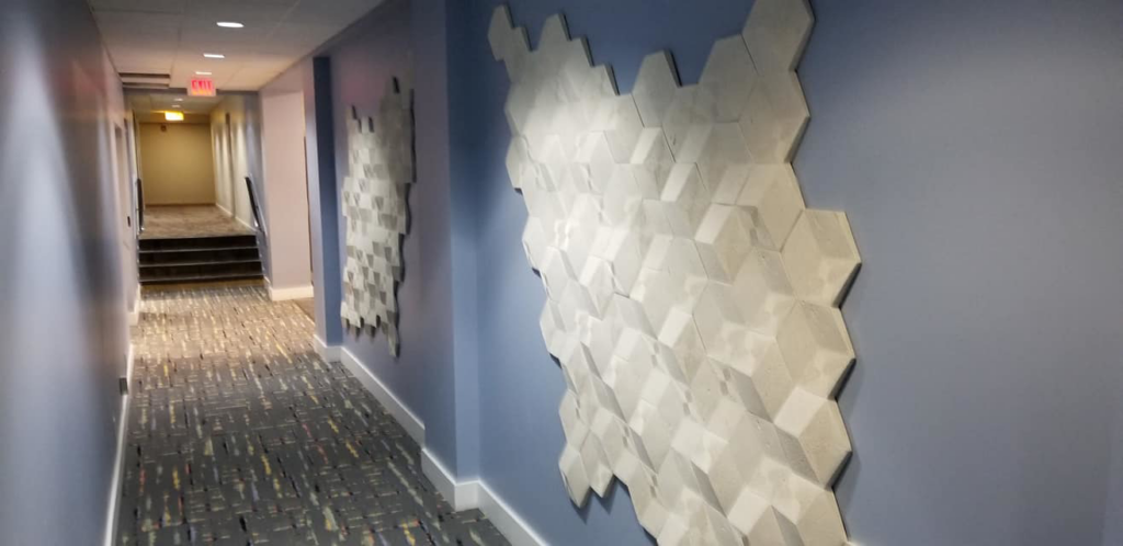 A newly installed patterned carpet in a commercial hallway by Point Place Flooring in Toledo, OH.