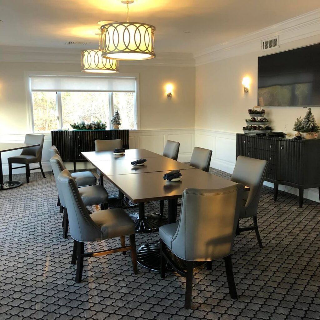 A beautifully installed patterned carpet in a commercial dining room by National Carpet and Flooring in Tyngsboro, MA.