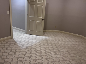 A room featuring a newly installed patterned carpet by Kevin's Carpets of Lexington and Georgetown, KY.