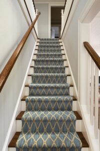 A beautifully installed patterned carpet runner on a staircase by Custom Crafted Floors in Phoenix, AZ.