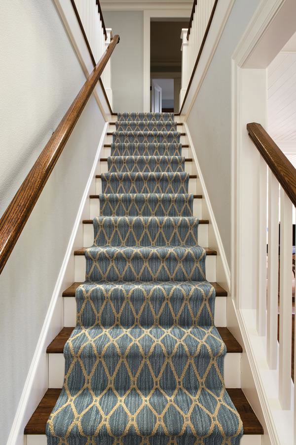 A beautifully installed patterned carpet runner on a staircase by Custom Crafted Floors in Phoenix, AZ.