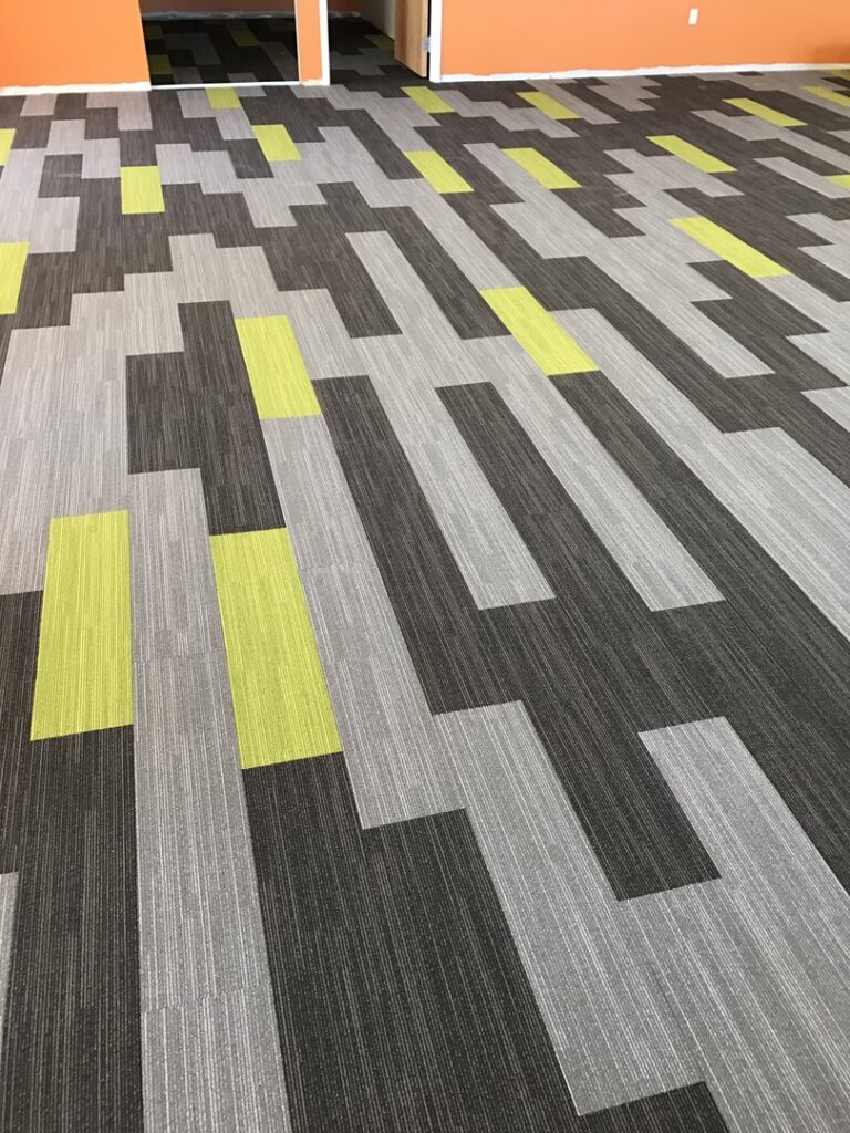 Stylish patterned carpet tile installation in a commercial office by CAP Flooring in Buffalo, NY
