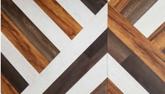 A close-up view of a beautifully patterned wood flooring installation by Northwest Carpet Company in Anchorage, AK