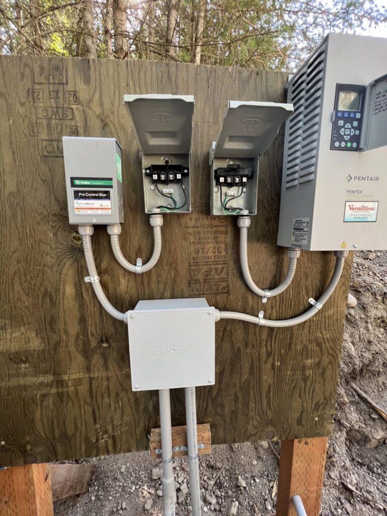 Electrical control boxes and conduits connected to a Pentair unit, installed by kt_electricalcontractors in Spokane Valley, WA