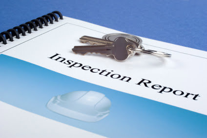 An inspection report and keys, symbolizing thorough pest control inspections by Omaha Pest Control, Inc. in Omaha, NE.