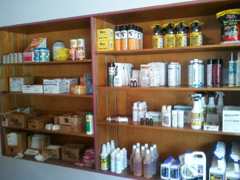 Shelves stocked with various pest control products and supplies at Franklin Pest Solutions Michigan City in Lafayette, IN.