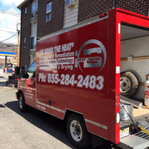 A red service truck for thermal heat remediation and pest control from Everything Bed Bugs, Removal & Remediation in Edison, NJ.