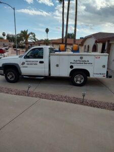 A House Doctor Exterminating service truck with "Full Termite & Pest Control Service" displayed in Glendale, AZ.