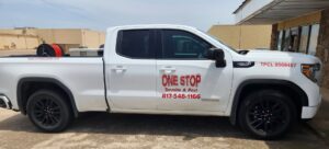 A white pest control service truck with equipment, branded for One Stop Termite & Pest Control in Memphis, TN.