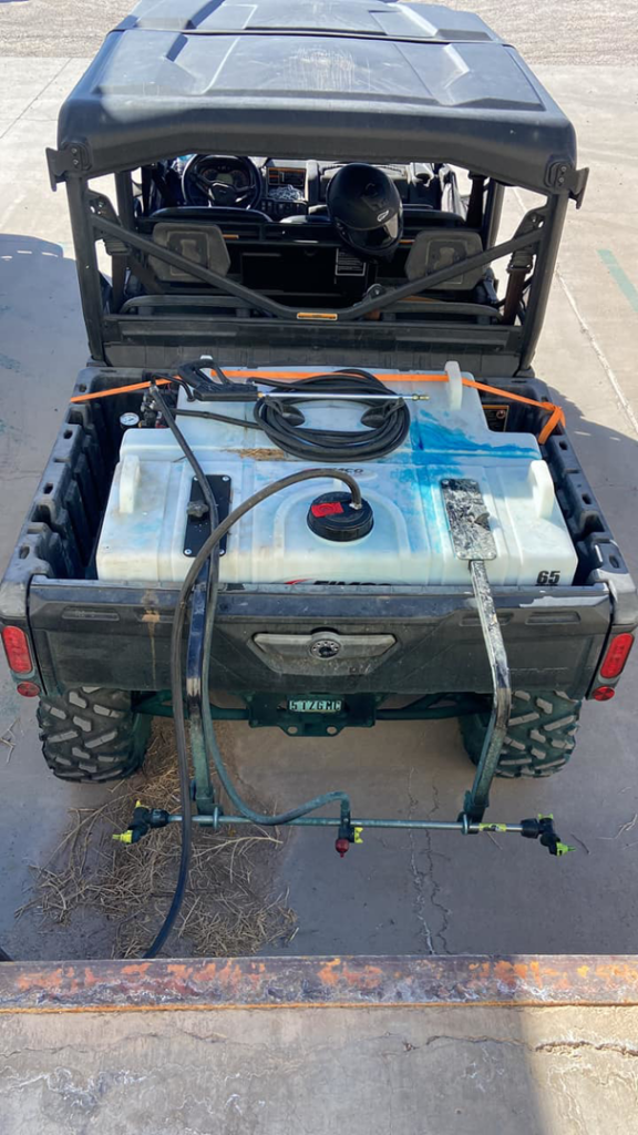 A utility vehicle with pest control spray equipment in the back for Advantage Pest & Weed Control in Rio Rancho, NM