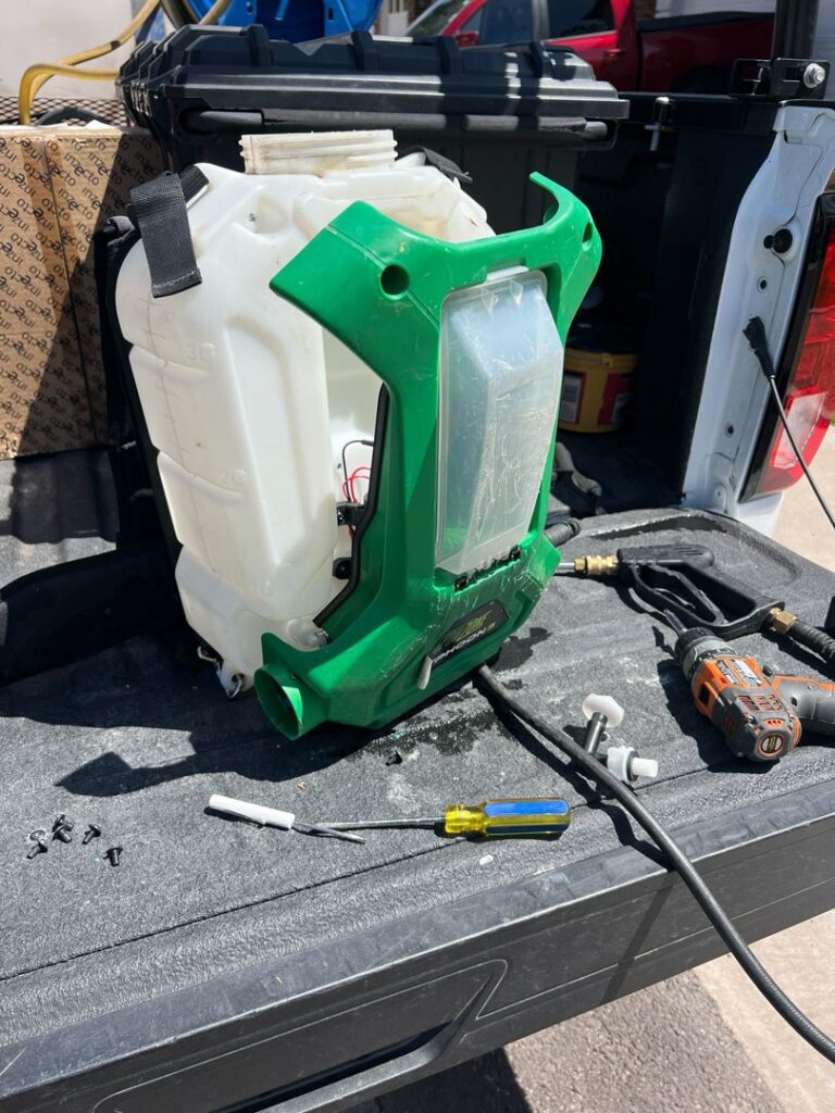 Pest control backpack sprayer and tools in the back of a CAPE Pest Control truck in Mesa, AZ