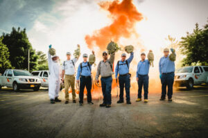 A Fox Pest Control team holding removed wasp nests after a job in Glen Ellyn, IL