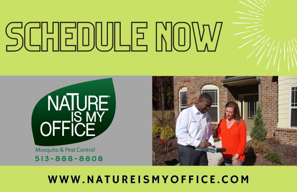 A Nature Is My Office LLC pest control technician discussing service details with a customer in Cincinnati, OH.