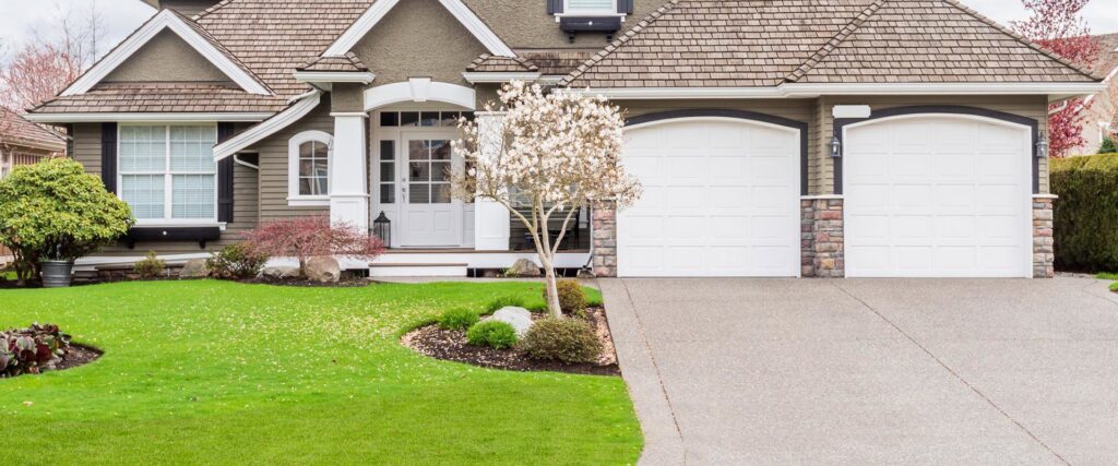 A Pest Express Pest & Termite Control technician greeting a customer at their home in Cedar Rapids, IA
