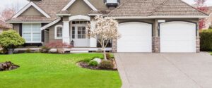 A Pest Express Pest & Termite Control technician greeting a customer at their home in Cedar Rapids, IA