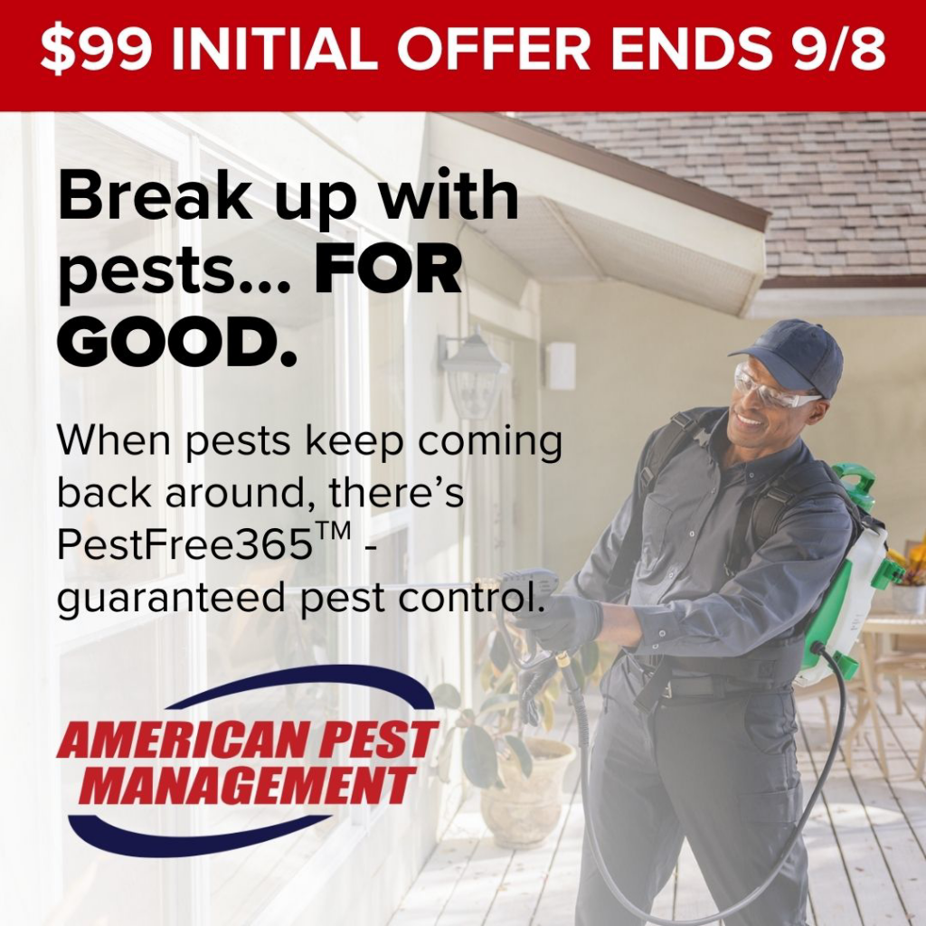 A pest control technician spraying the exterior of a house for American Pest Management in Saint Petersburg, FL.