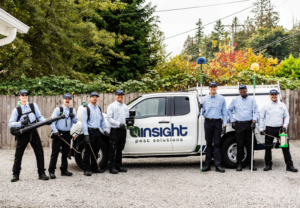 A team of pest control technicians with their equipment and branded truck from Insight Pest Solutions- Northwest in Federal Way, WA