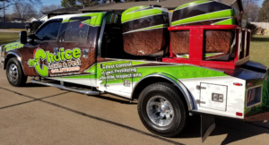 A branded pest control truck from 1st Choice Lawn & Pest Solutions, ready for service in Hastings, NE.