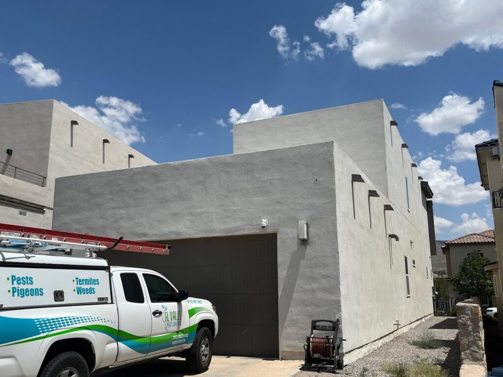 An El Valle Pest Control truck parked in front of a residential building, ready for service in El Paso, TX